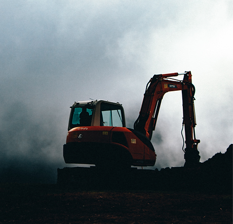 an excavator digging in the middle of nowhere _edited.png