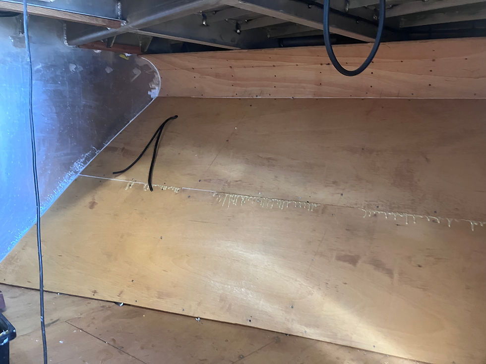 Starboard side focsle lining panels ready for carpet lay