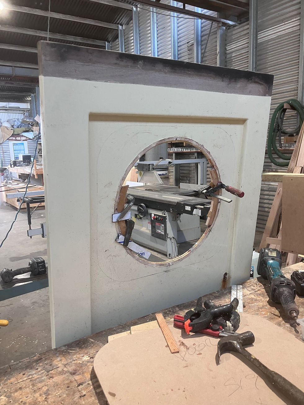 Door showing old circular window cutout