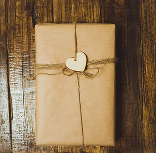 handcraft-gift-boxe-with-red-heart-wooden-table-top-view.jpg
