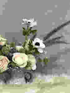 Close up of a floral arrangement for a winter wedding