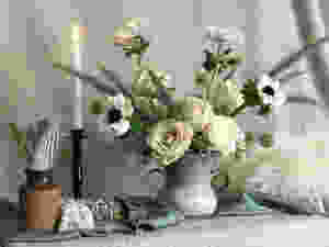 Floral arrangement and styling props for a winter wedding