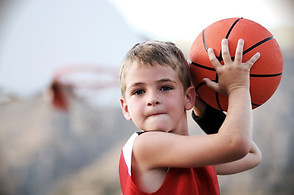 Boy Throwing Basketball