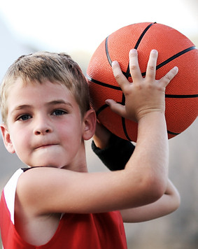 Boy Throwing Basketball