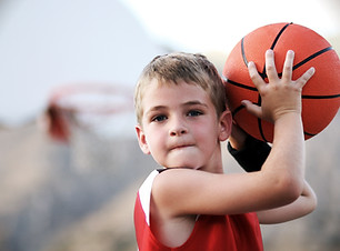 Boy Throwing Basketball