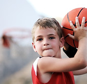 Boy Throwing Basketball