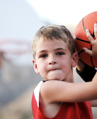 Boy Throwing Basketball