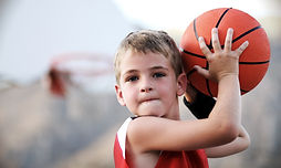 Boy Throwing Basketball