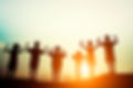 children-s-silhouettes-showing-muscles-sunset.jpg