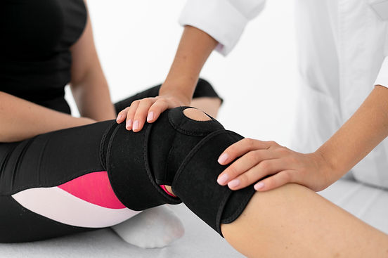 physiotherapist-helping-female-patient-her-clinic.jpg