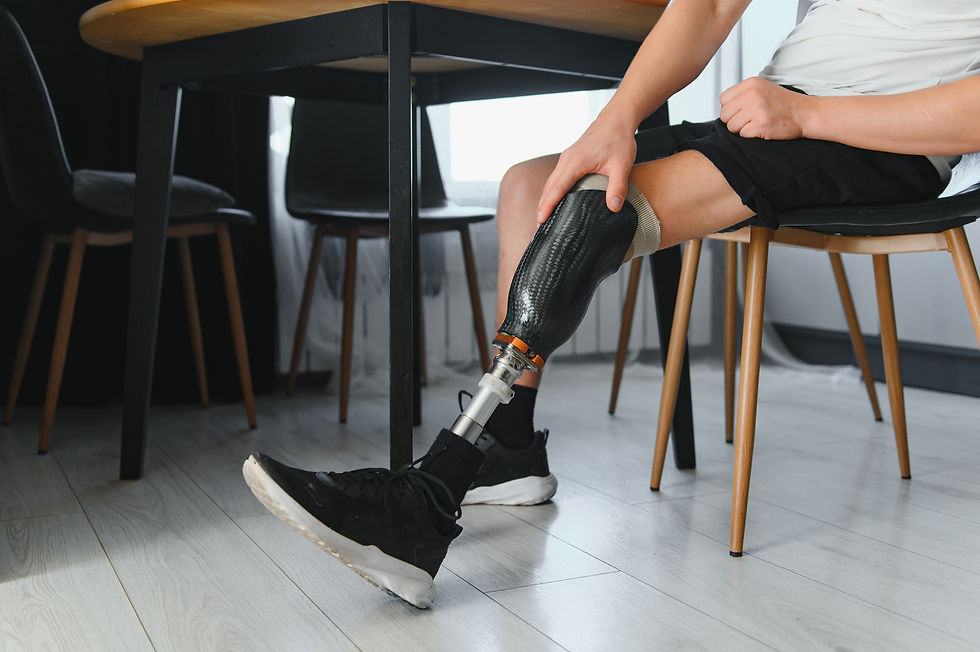 portrait-man-with-prosthetic-leg-sitting.jpg