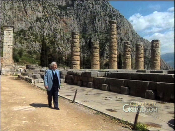 Image of Host & Narrator, actor Sir Peter Ustinov (Two-Time Academy Award® Winner) pictured in a scene from "Hippocrates in Olympia" while he was viewing the Temple of Apollo in Delphi, Greece, site of the Ancient Delphic Oracle.