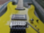 Floyd Rose bridge and sustainer control switches
Taisto Guitars CREO series guitars family picture including 7-, 6- and 8-string versions
Taisto Guitars FIRENZA-GT custom guitar body backside
Taisto Guitars AROK-BG Bigsby sulfur yellow custom guitar