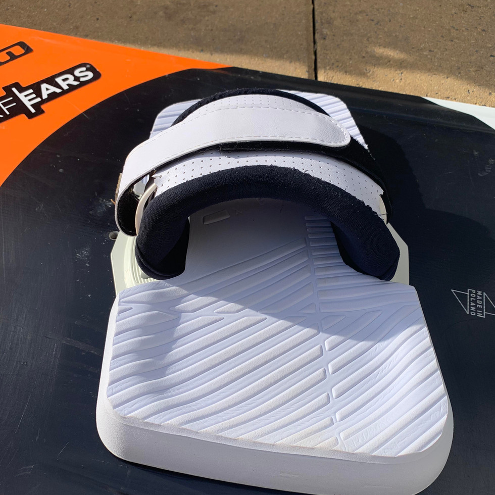 White kitesurfing foot straps on board