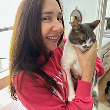 Jennifer holding a clients cat