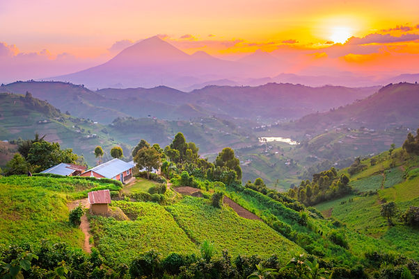 Kisoro Uganda beautiful sunset over mountains and hills of pastures and farms in villages
