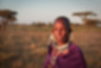 A Maasai woman in the savanna in Tanzania