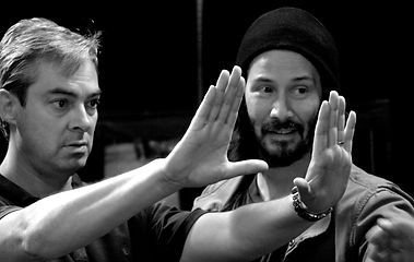 Robert Shackldy working with Keanu Reeves