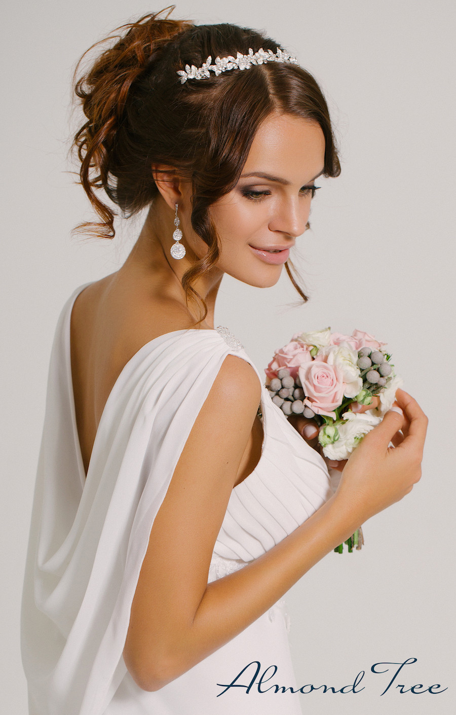 Beautiful Happy Bride in White Bridal Wedding Dress from Almond Tree Wedding Boutique