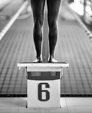 low-section-woman-standing-poolside.jpg