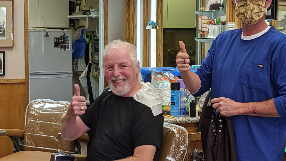 Dennis gets a haircut and we go to the first open bar!