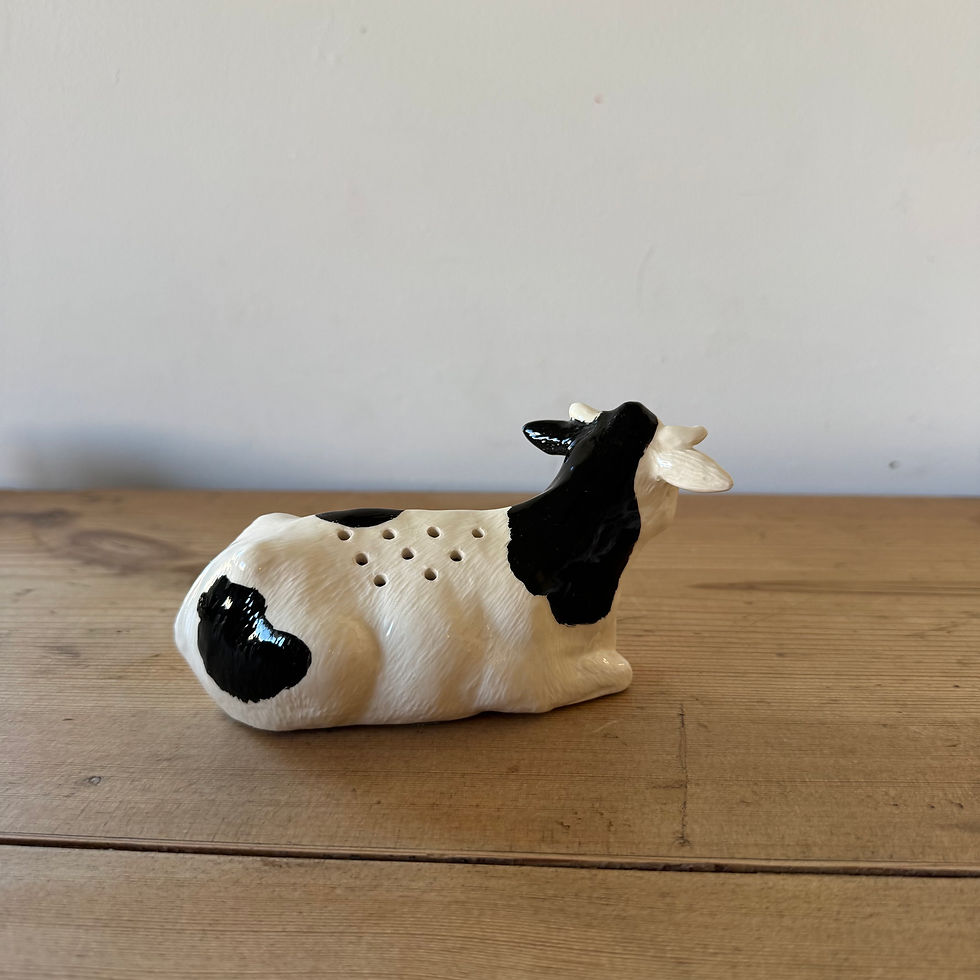Thumbnail: hand crafted cow shaker