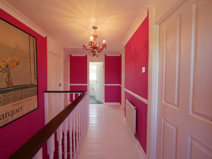 Pink walls with white woodwork - upstairs