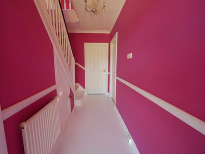 Pink walls with white woodwork - downstairs