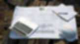 Laptop, blueprints, hard hat, checklist: Construction project planning