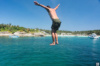Jumping in the water in Patok Bay, Koh Racha Yai