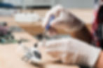 male-technician-hand-repairing-helicopter-toy.jpg