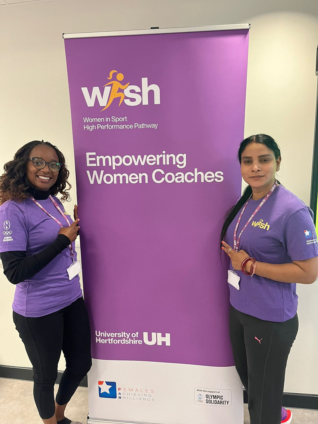 Athletics Coach Ntasuwila Namukonda pictured with Colleagues during the WISH residential session