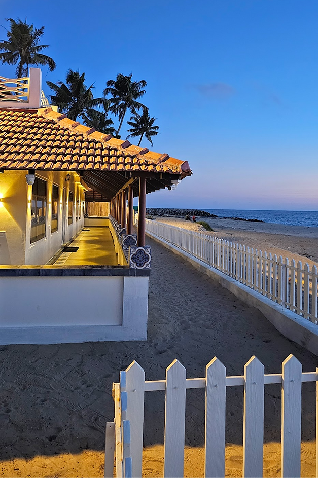 Side of the verandah of ETHER Beachfront homestay in Marari