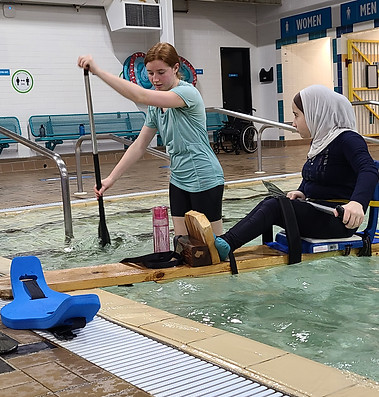 Disabled atlete winter training with paracanoe modified equipment