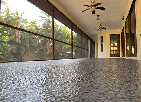 Epoxy flake flooring on outdoor patio with slip-resistant surface
