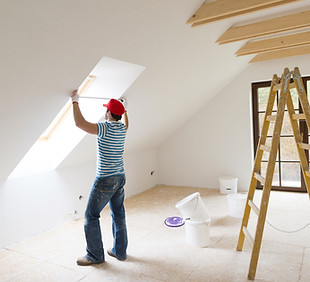 Painter Renovating Room