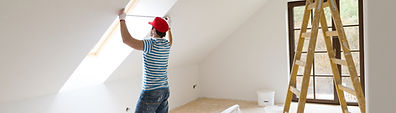 Man Measuring Window