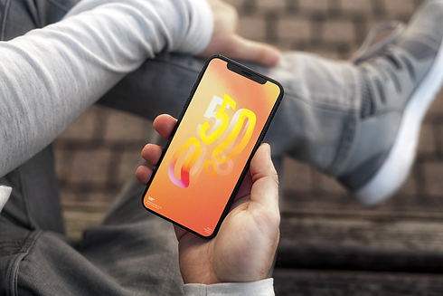mockup-of-a-young-man-holding-an-iphone-