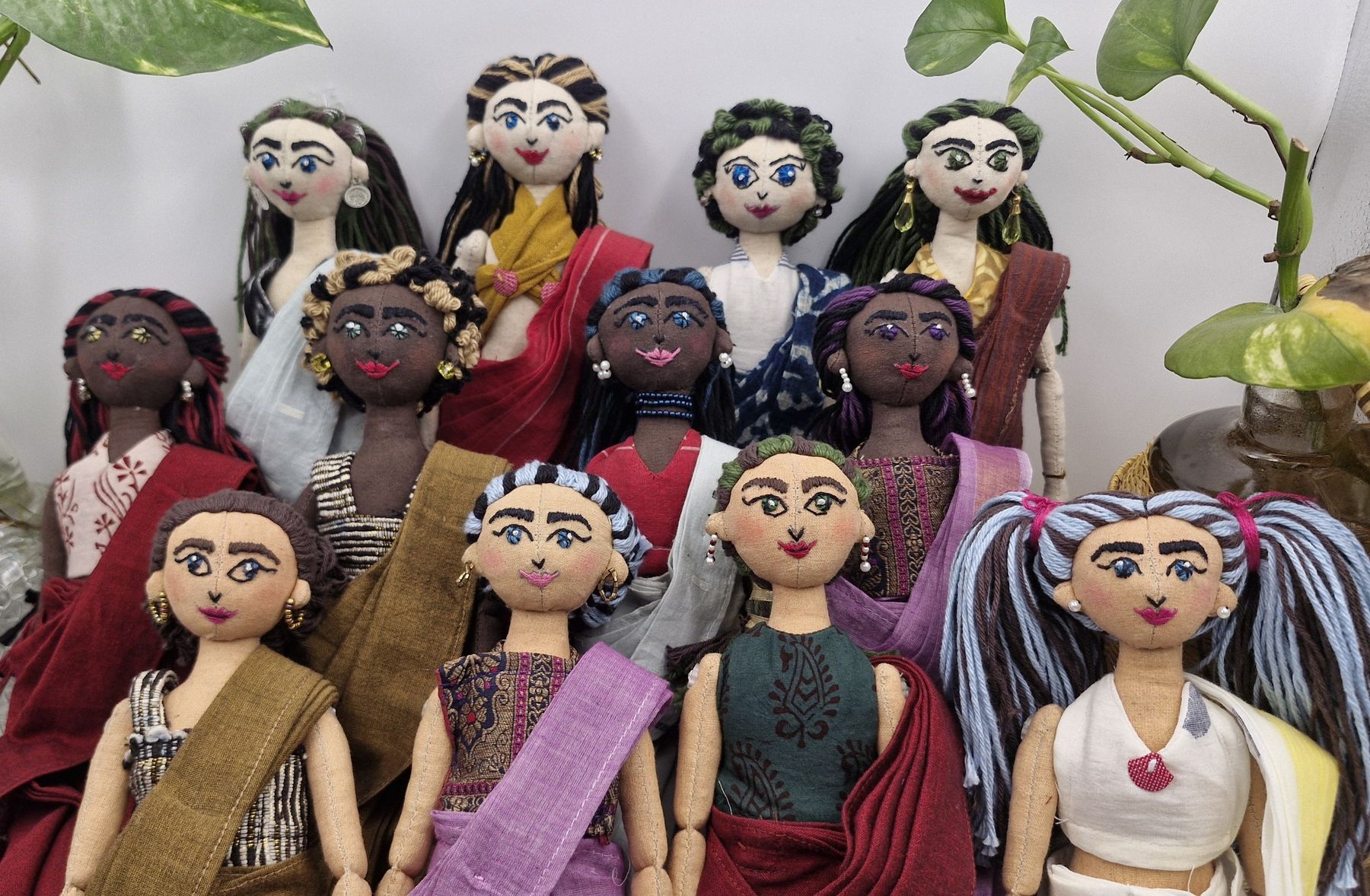 Masakali dolls, each dressed in a miniature handloom sari