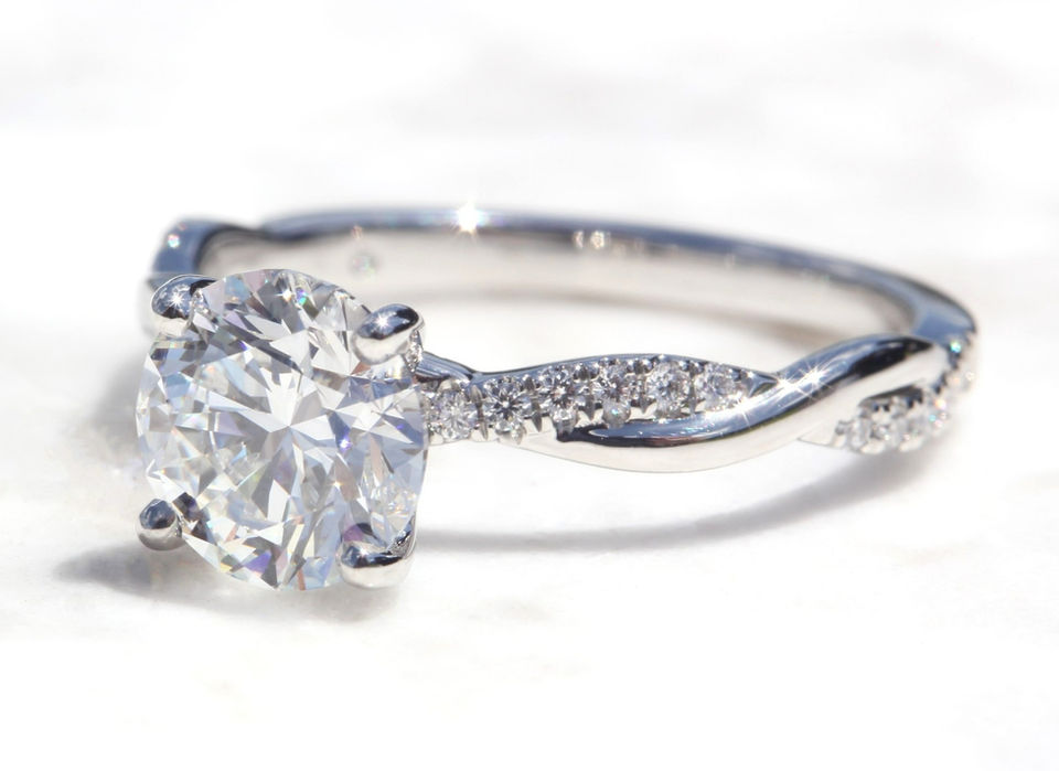custom diamond engagement ring with a twisted accented shank.