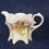 Thumbnail: Floral Patterned Glass Pitcher with White Background and Footed Base