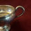 Thumbnail: Silver Spouted Creme Pitcher with Heavy Patina
