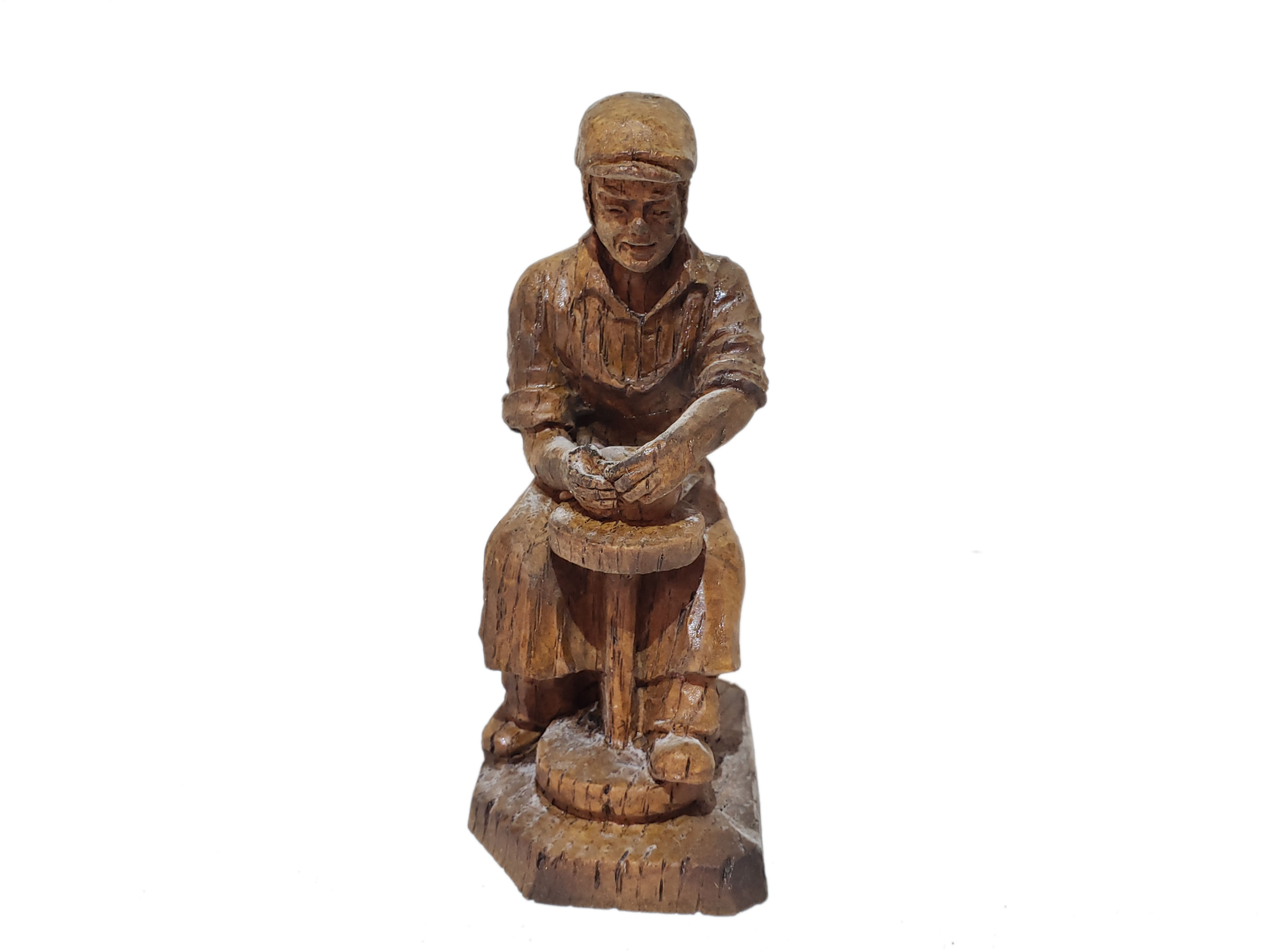 Wooden Figurine at Work Station