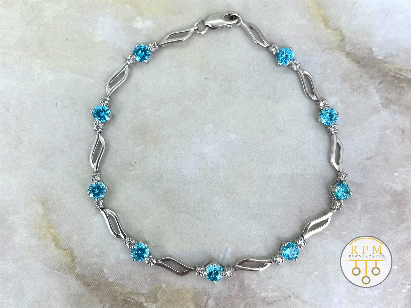 9ct White Gold Diamond and Topaz Bracelet