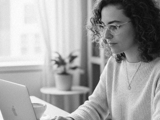 Woman at desk with computer