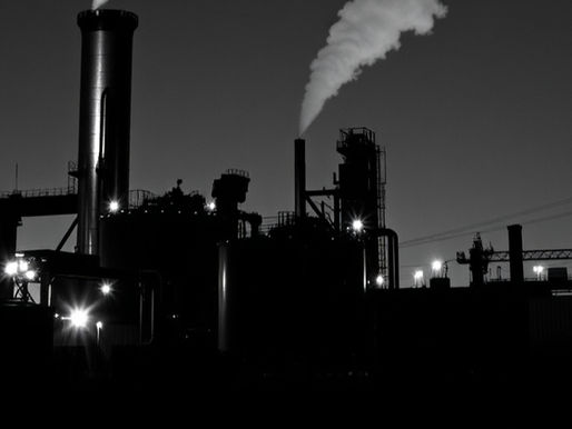 A skyline view of a business (factory) that is a member at a trade association and whose employees are part of an professional association  