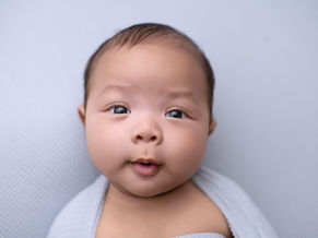 Prattville, AL Newborn Photography - Baby boy awake in blue