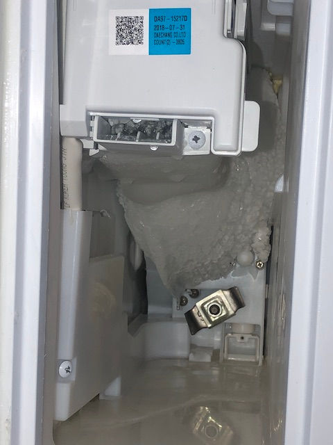 A frozen Samsung ice maker
