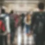Students with backpacks move through a crowded hallway, creating a busy scene of daily life between classes
Students with backpacks move through a crowded hallway, creating a busy scene of daily life between classes
