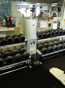 personal training, dumbells on rack in personal training studio 